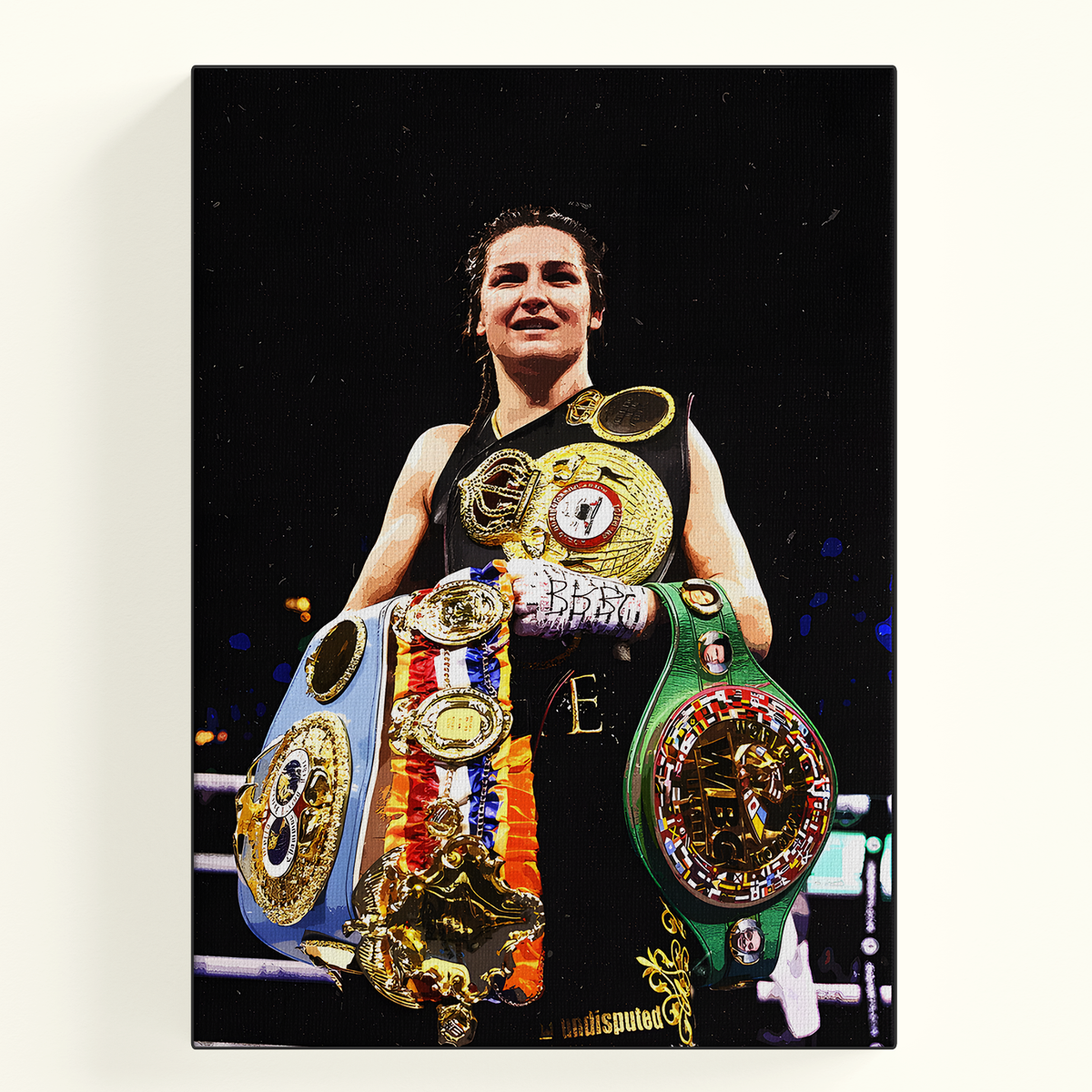 Boxer Katie Taylor holding her championship belts
