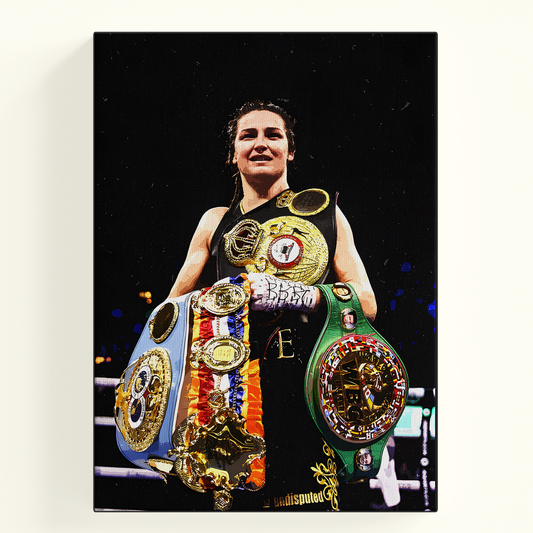 Boxer Katie Taylor holding her championship belts